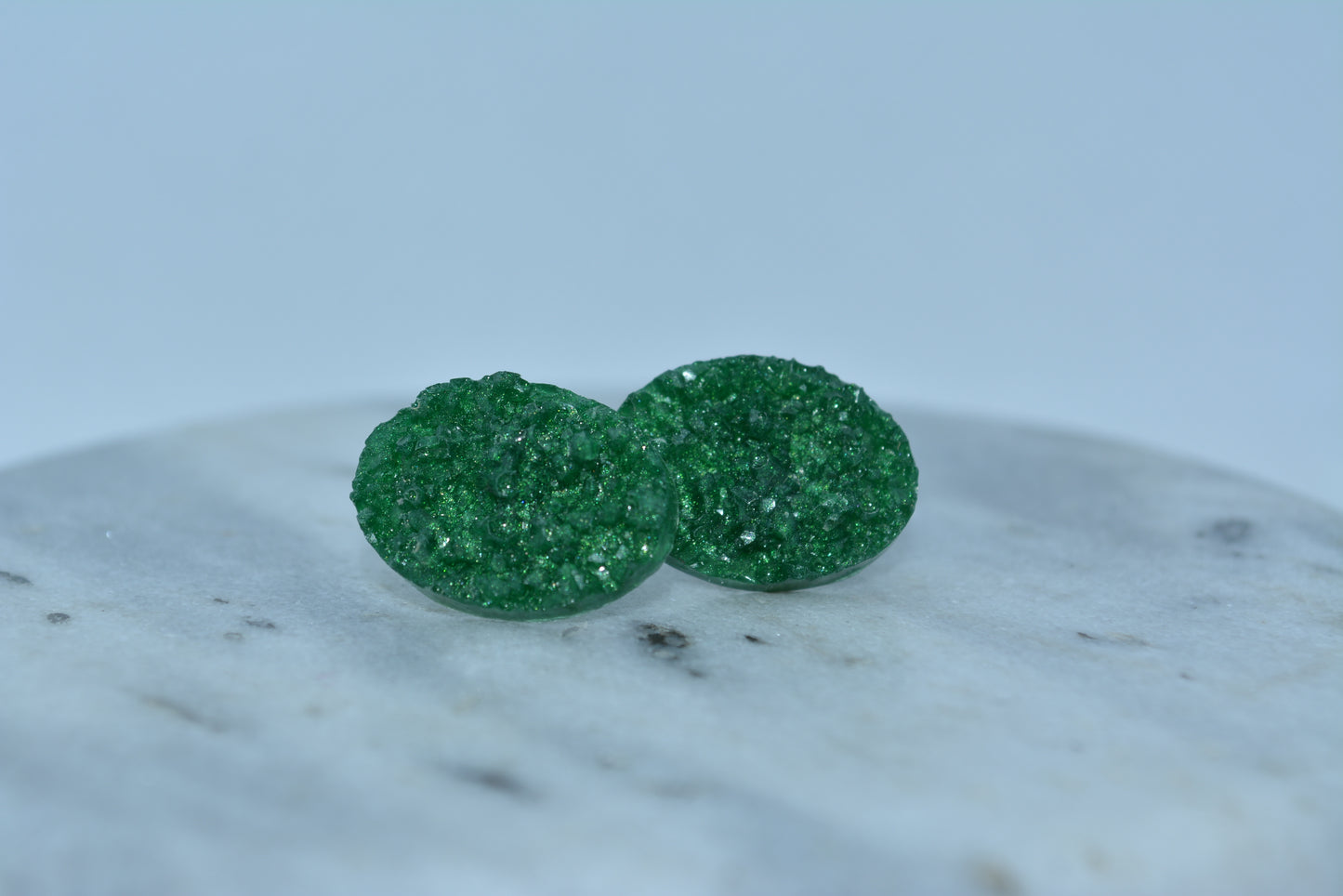 Green gemstone studs