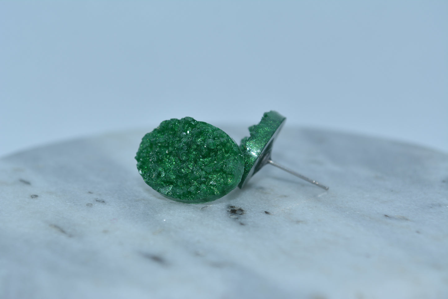 Green gemstone studs