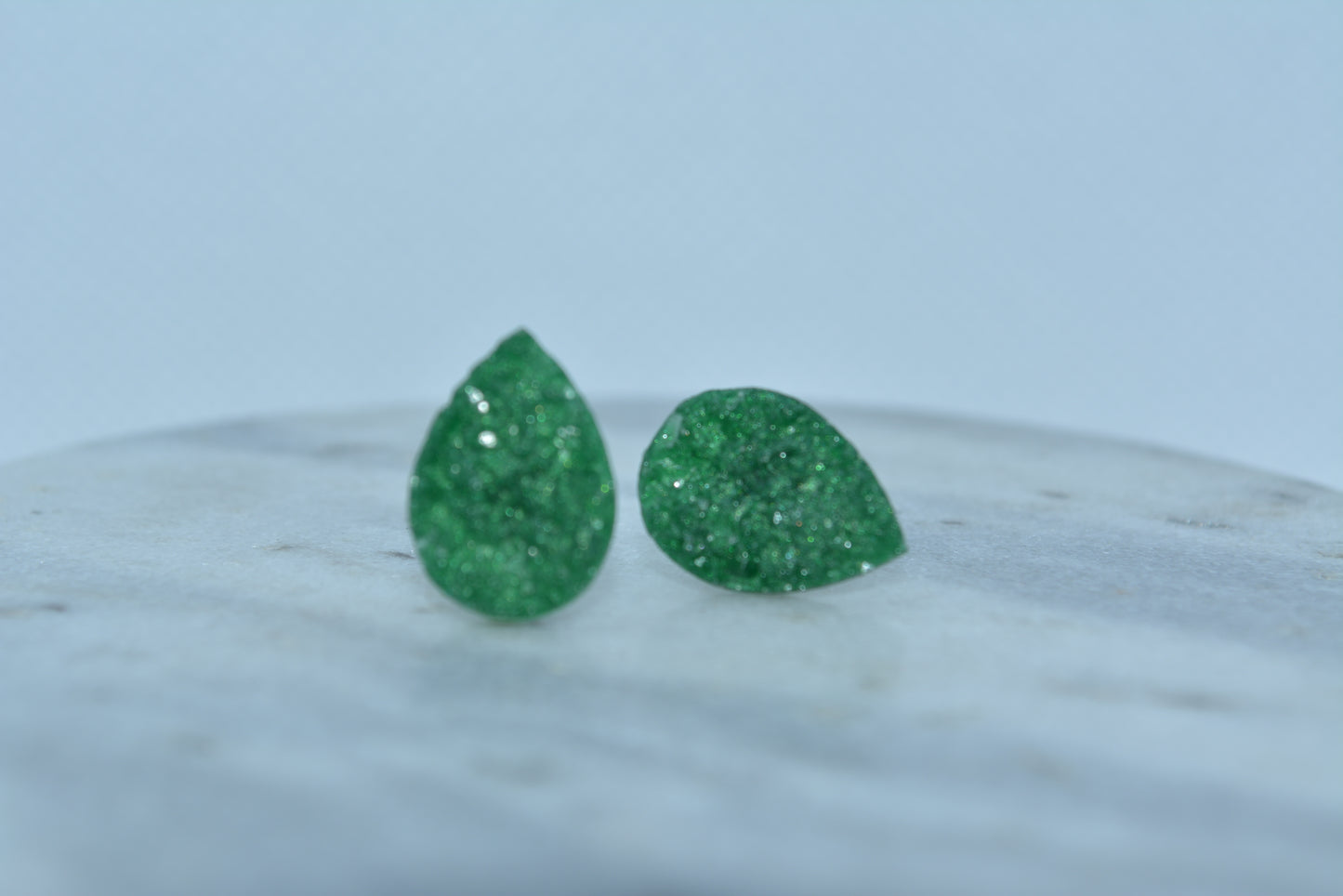 Green gemstone studs