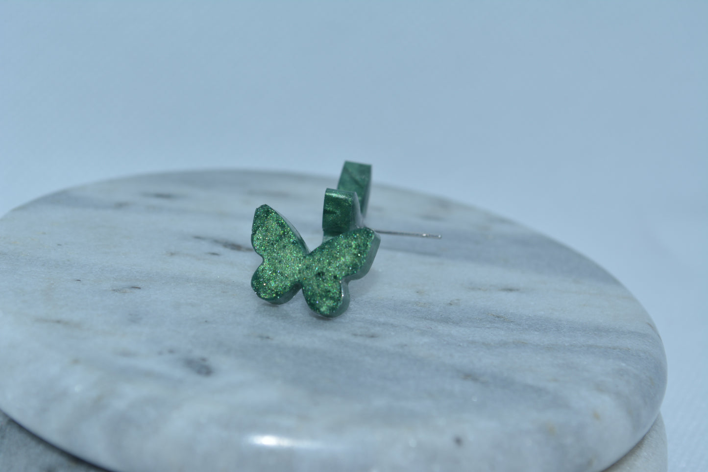 Green gemstone studs