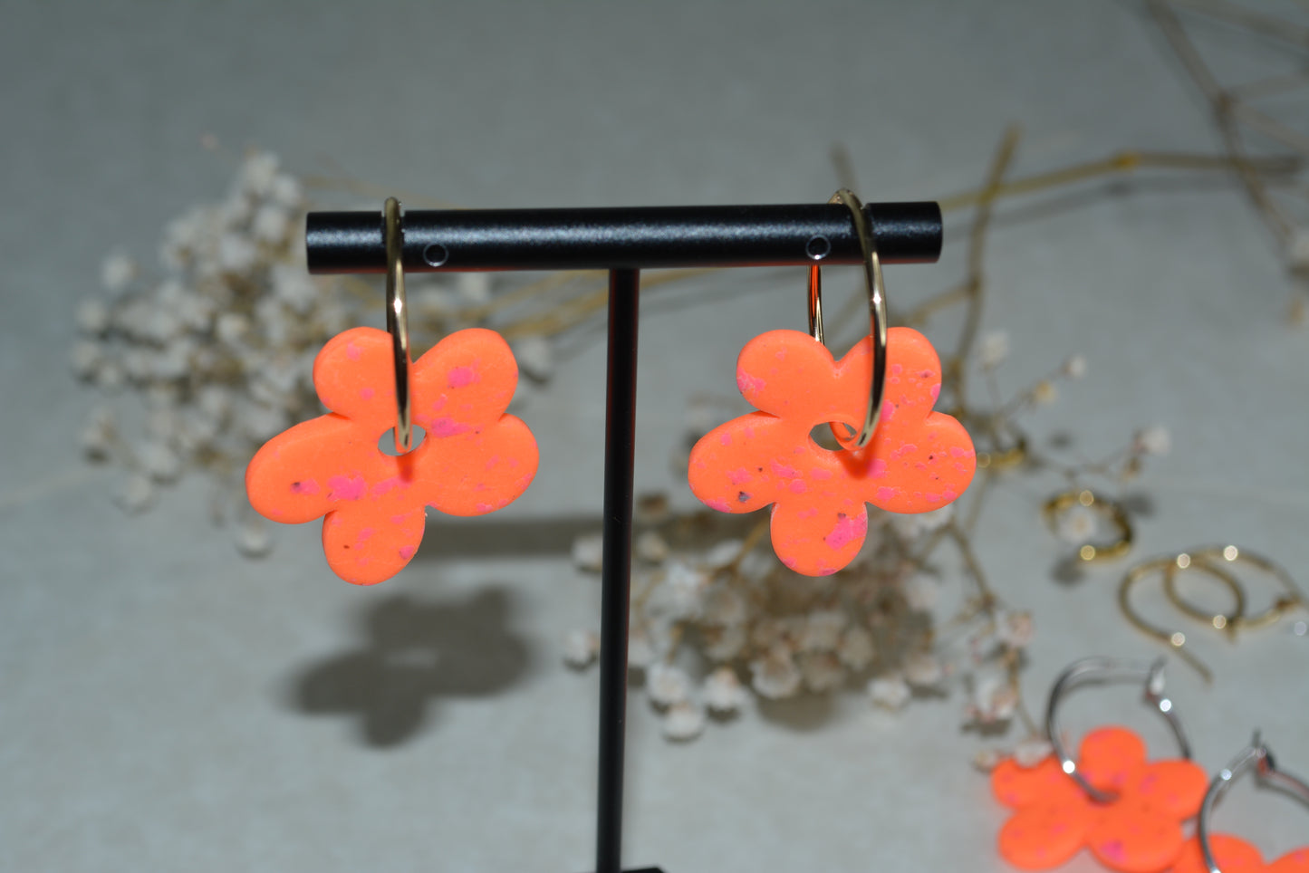 neon orange flower hoops