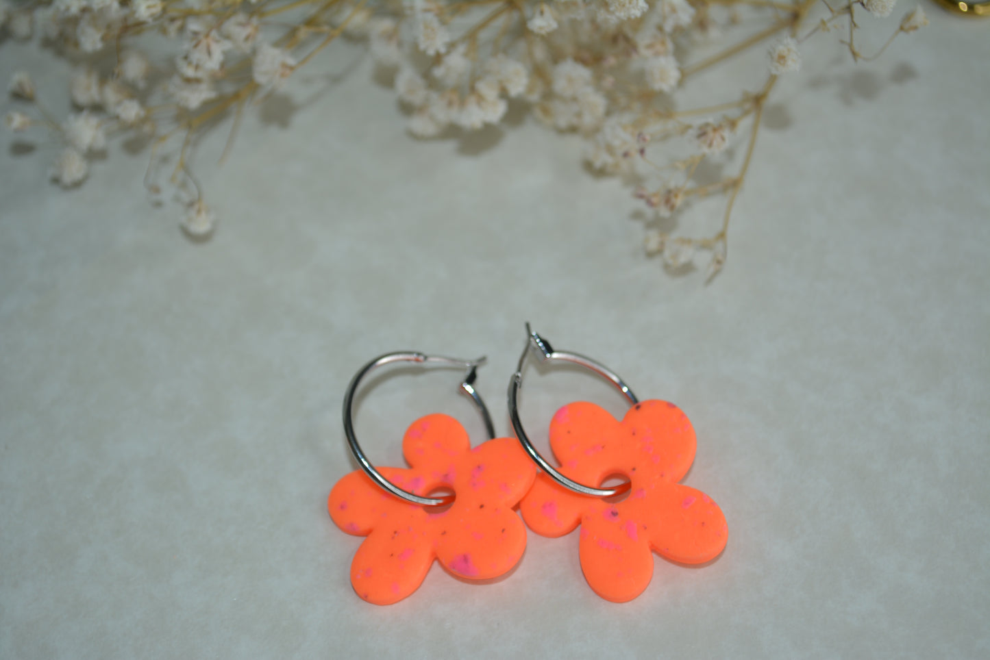 neon orange flower hoops