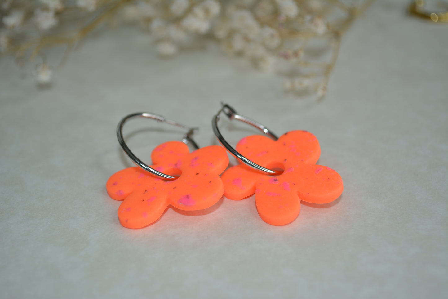 neon orange flower hoops