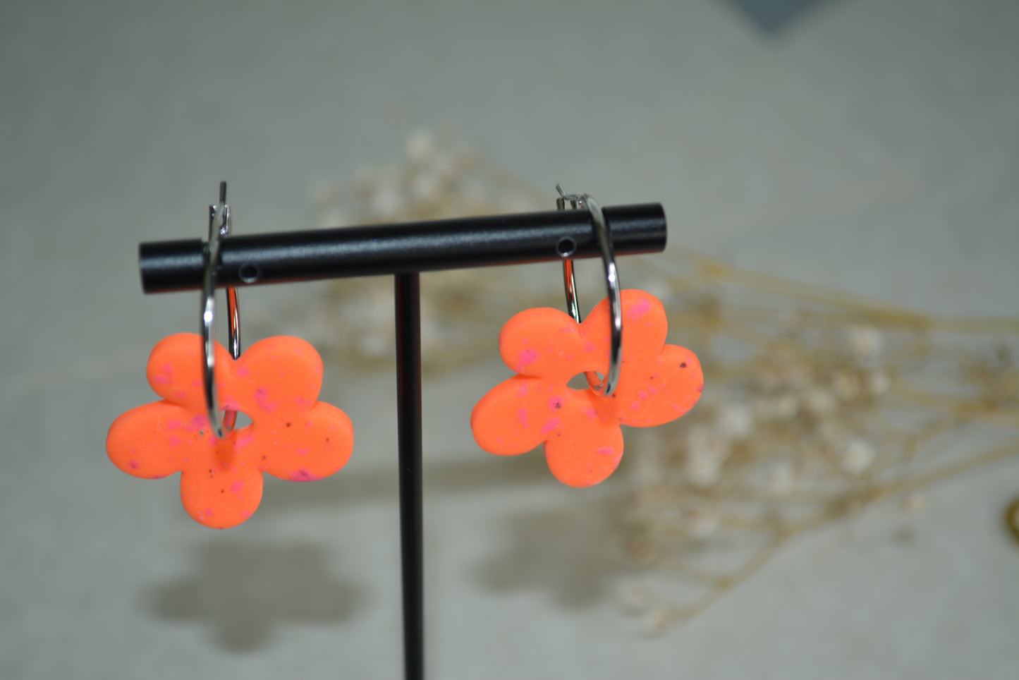 neon orange flower hoops