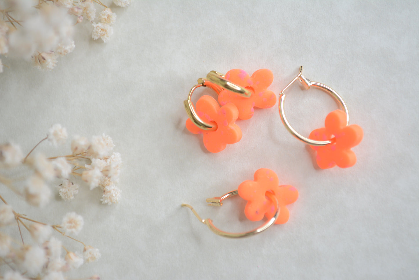 neon orange flower hoops