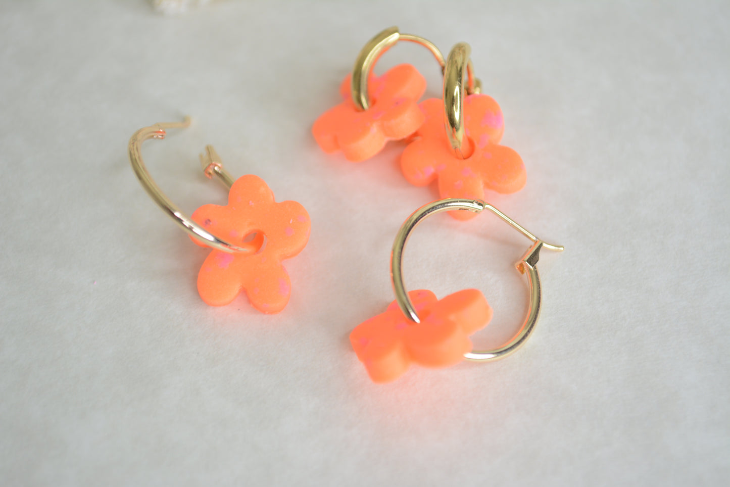 neon orange flower hoops
