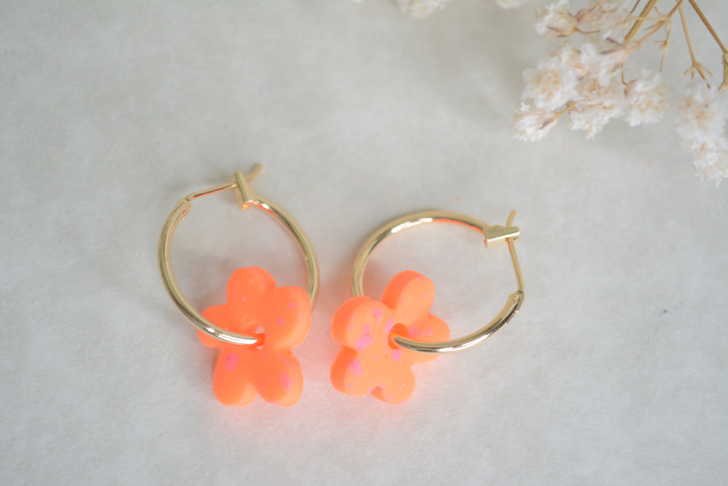 neon orange flower hoops