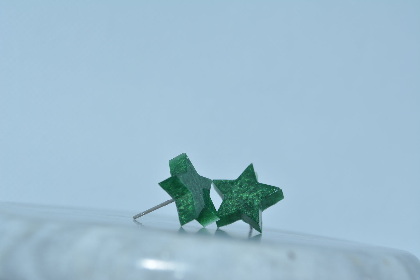 Green gemstone studs