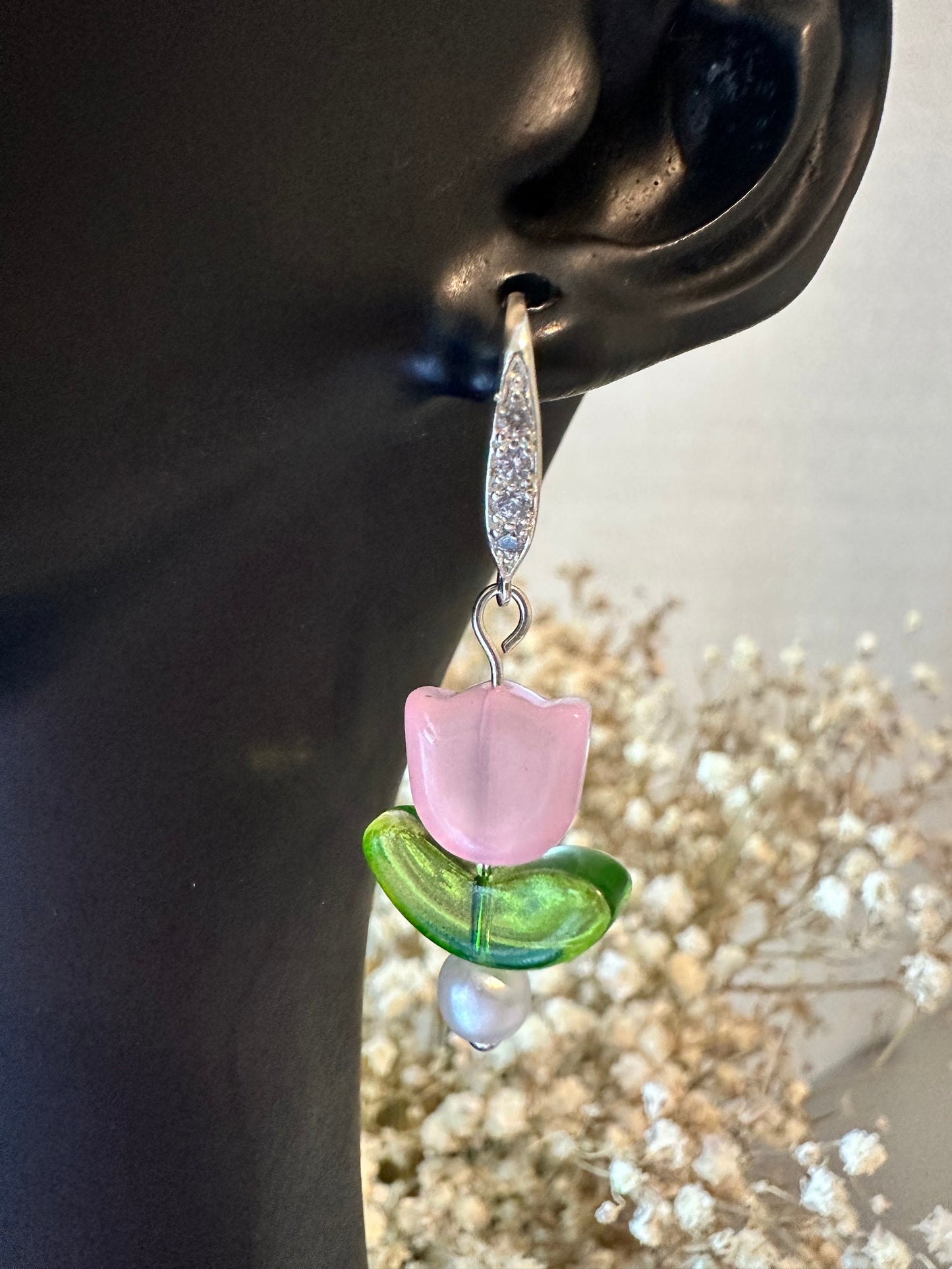 silver dangle earrings with cubic zirconia with a pink tulip