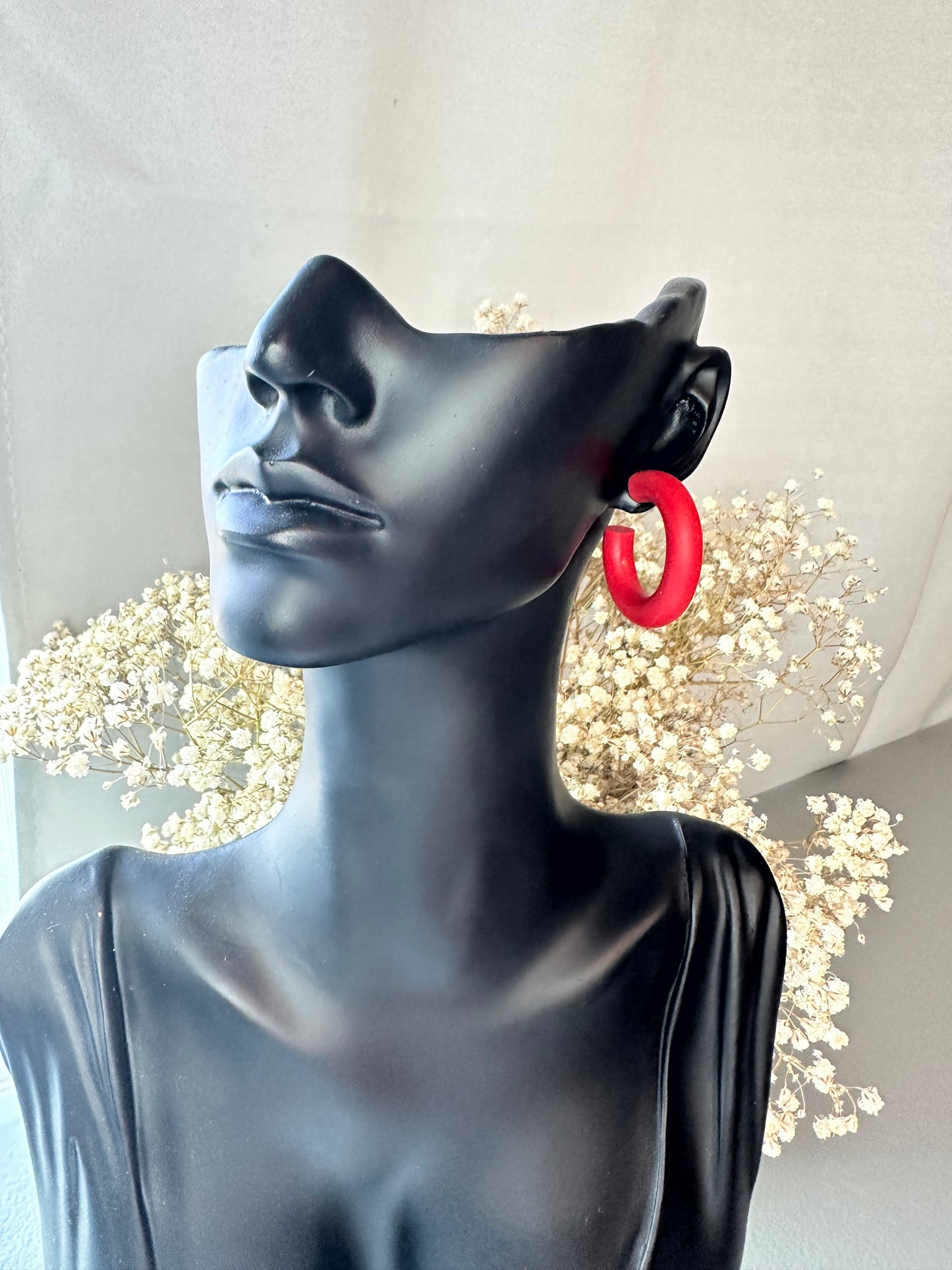 Red hoop earrings