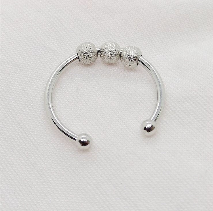 Silver spinner beads ring